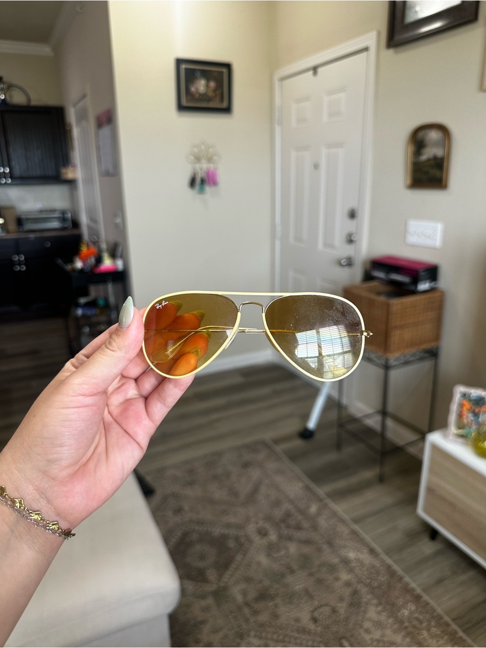Ray-Ban Gold Frame Sunglasses with Yellow-Orange Lenses